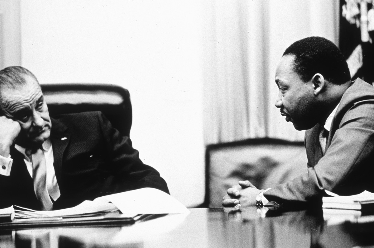 President Lyndon B Johnson discusses the Voting Rights Act with Martin Luther King Jr. at the White House in 1965.