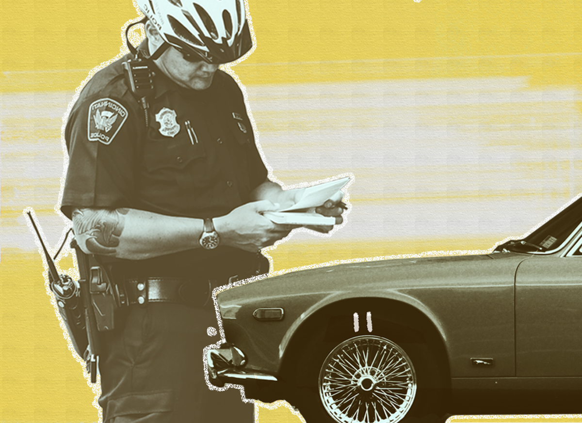A cop writes a parking ticket