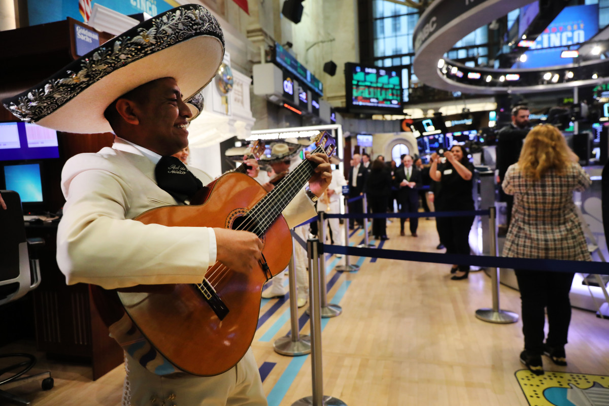 In celebration of Cinco de Mayo, a mariachi band performs on the floor of the New York Stock Exchange on May 3rd, 2019, in New York City. Stocks closed up nearly 200 points following news of a strong jobs report and other indicators showing signs that the global economy is healthier than previously expected.