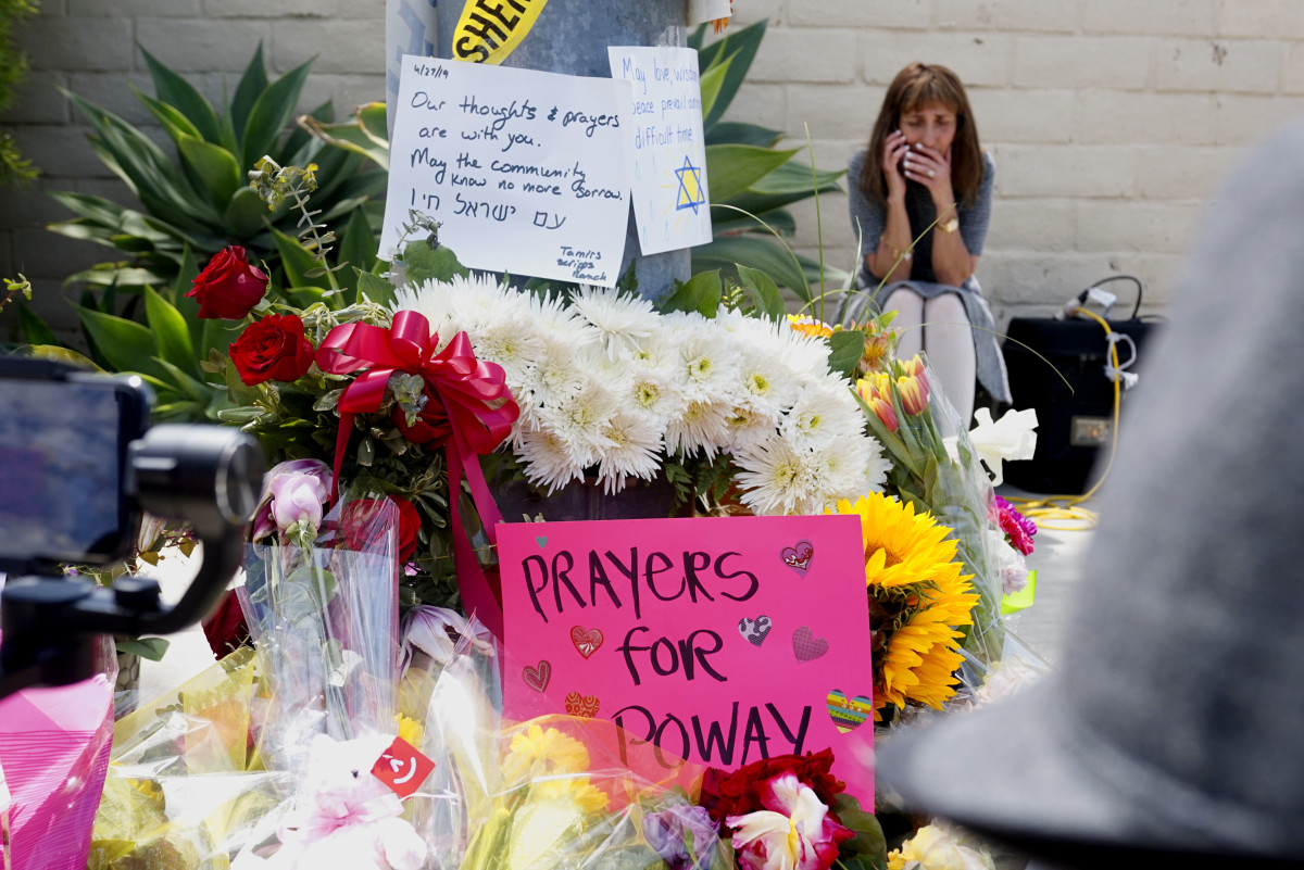 A makeshift memorial sits across the street from the Chabad of Poway Synagogue on Sunday, April 28th, 2019, one day after a gunman opened fire on worshippers.