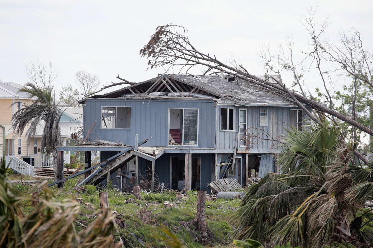 A tree rests on the roof of a home that was heavily damaged by Hurricane Michael on May 9th, 2019, in Mexico Beach, Florida. Seven months after the Category 5 hurricane made landfall near the small community, the town is still littered with damaged and destroyed homes and businesses. According to the Federal Emergency Management Agency, $1.1 billion has been spent on Hurricane Michael-related response and recovery efforts in the state.