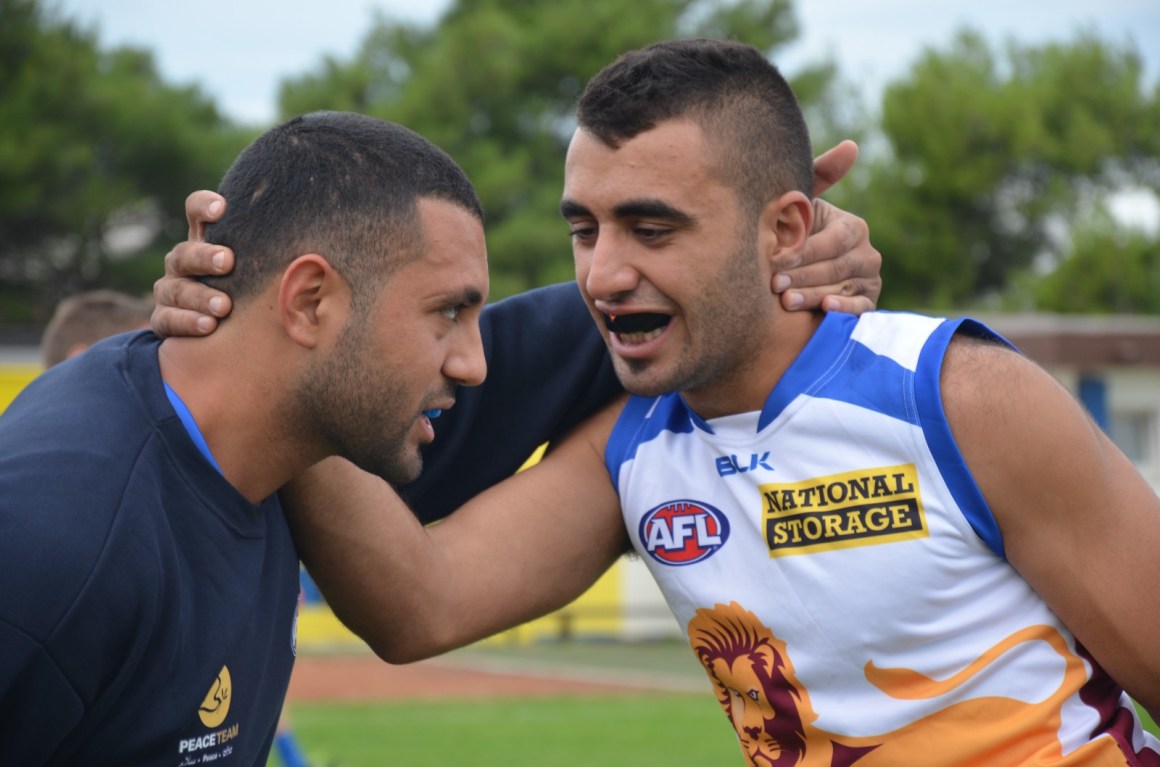 Sadek Shanina (right) and Majd Awad strategize before a game.