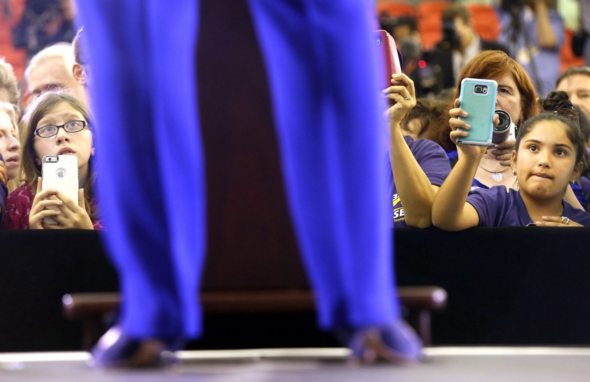 Young women listening as Hillary Clinton campaigns in Newark, New Jersey, on June 1st, 2016.