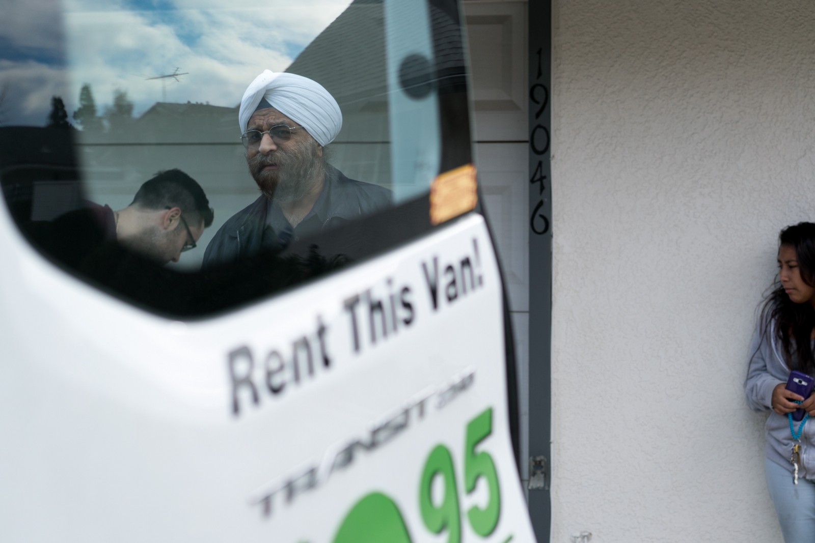 Jitender Singh looks into the back of a moving truck as office supplies are packed up with help from his employees. Singh has run a cyber-security firm out of his house in Porter Ranch for years, but finally decided to relocate temporarily because of the gas leak. “My wife was having symptoms, and a few of my employees complained about feeling sick, so it was time to go,” he says.