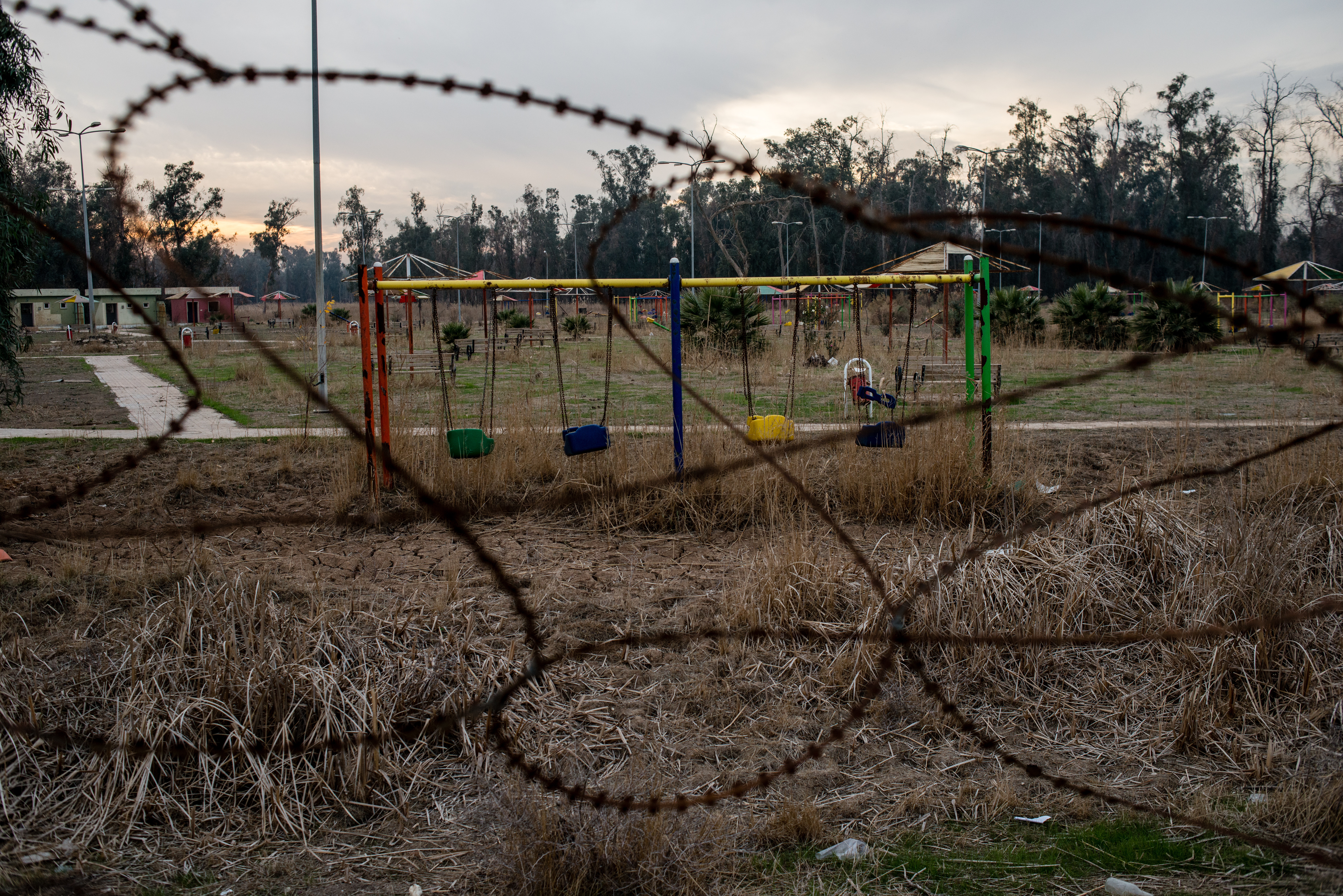 Swings sit empty in a playground city where two disabled boys were found wandering the grounds alone.