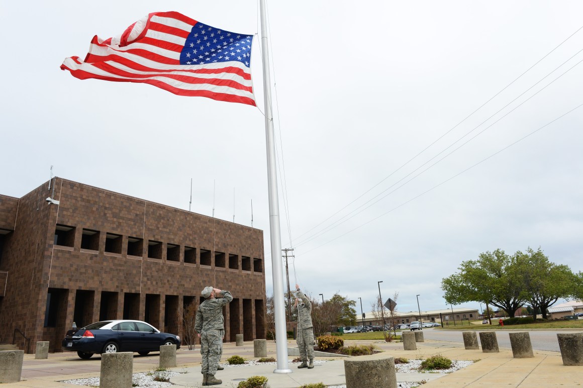 20th Fighter Wing Airmen lower the flag to half-mast at Shaw Air Force Base, S.C., April 5th, 2013. Capt. James Steel, 77th Fighter Squadron chief of mobility, was killed in the line of duty April 3th, after his aircraft crashed in Afghanistan returning to base from a close air support mission.