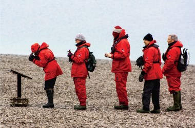 Lining up for a plaque on Beechey Island in the Canadian Arctic Archipelago of Nunavut, Canada.