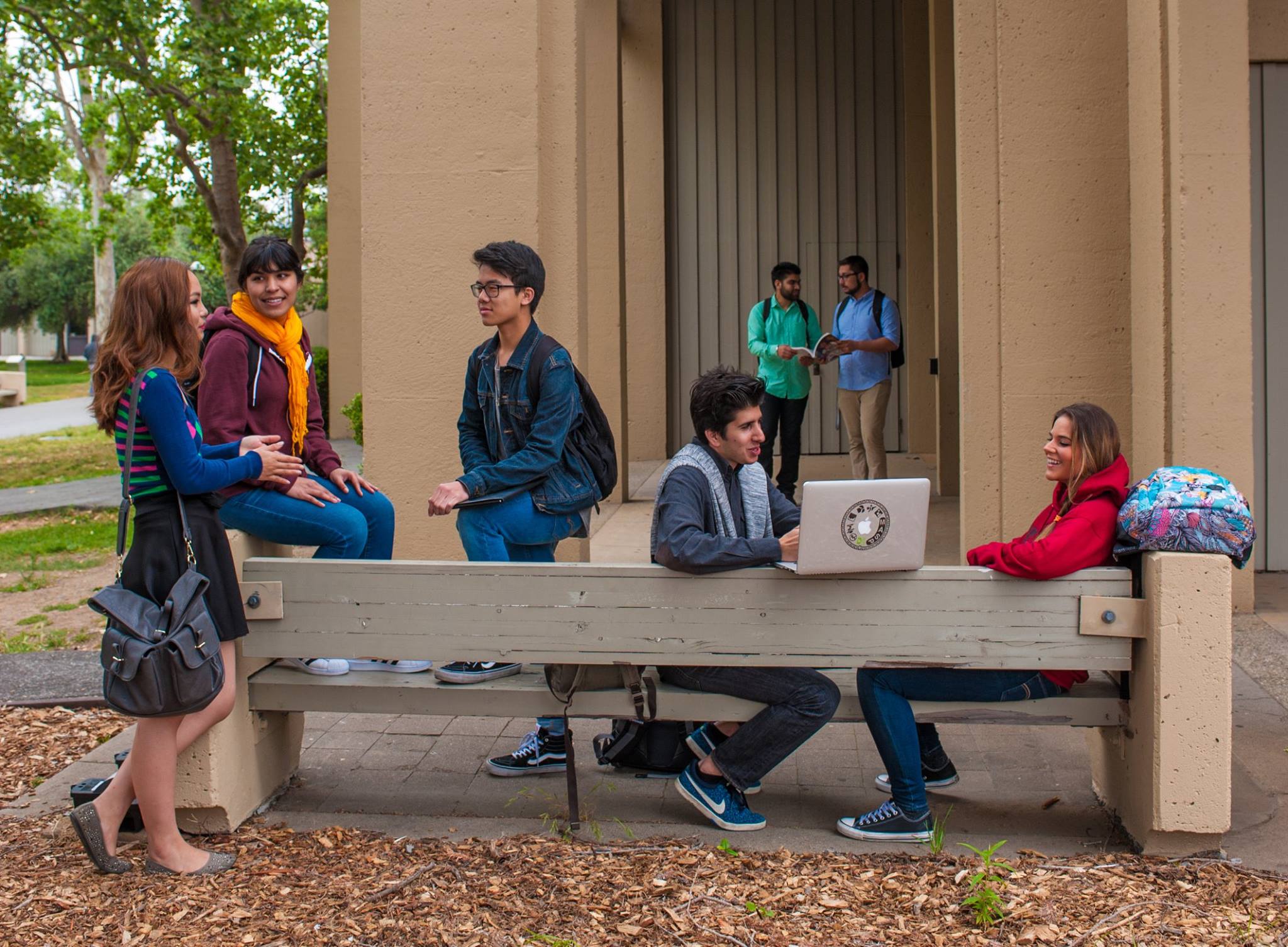 Students hang out on campus at De Anza College in Cupertino, California.