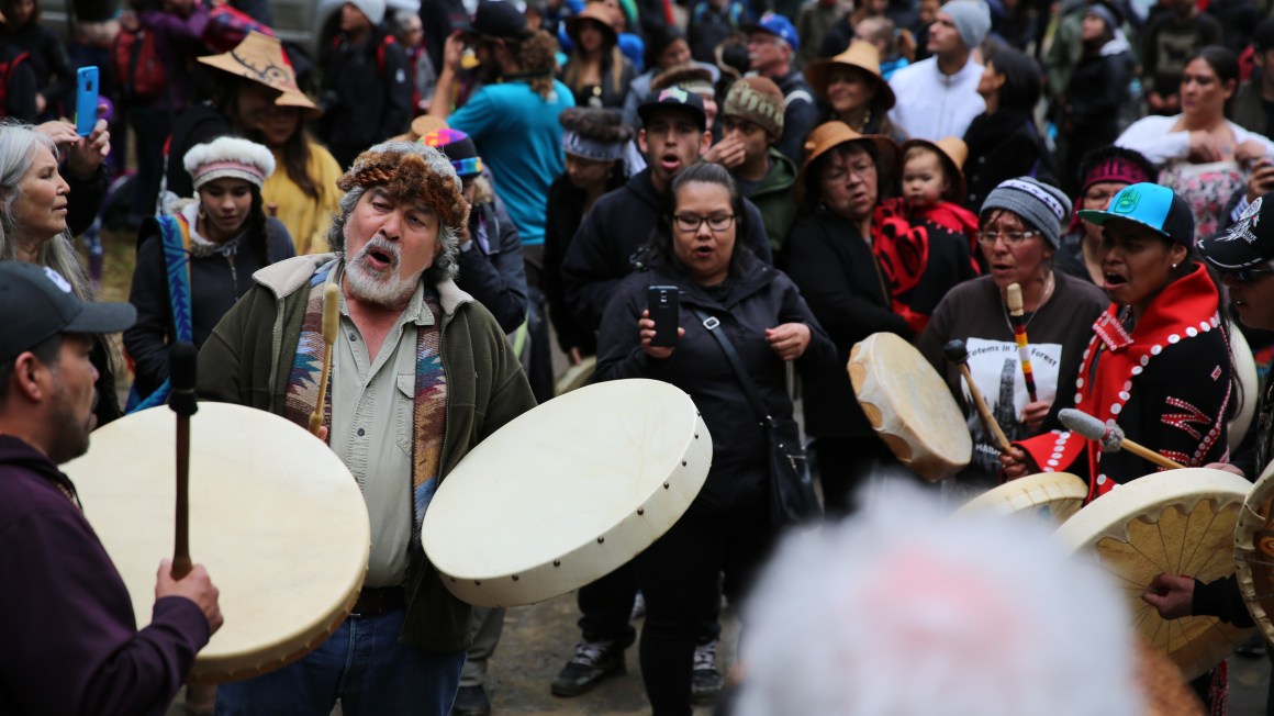 Guujaaw leads his tribe in song.