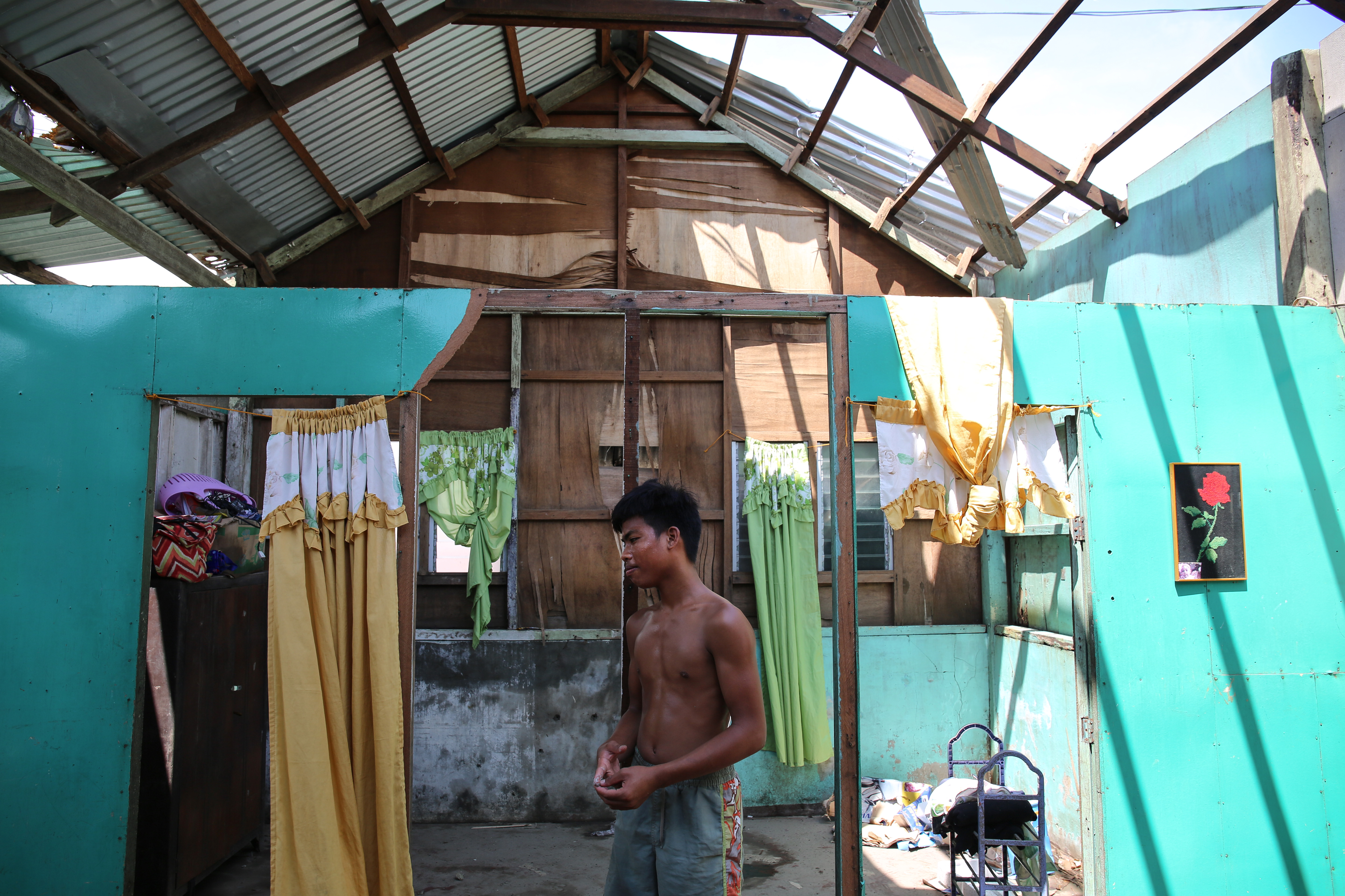 Sixteen-year-old Calvin John Caballo lost half of his roof to the typhoon. 