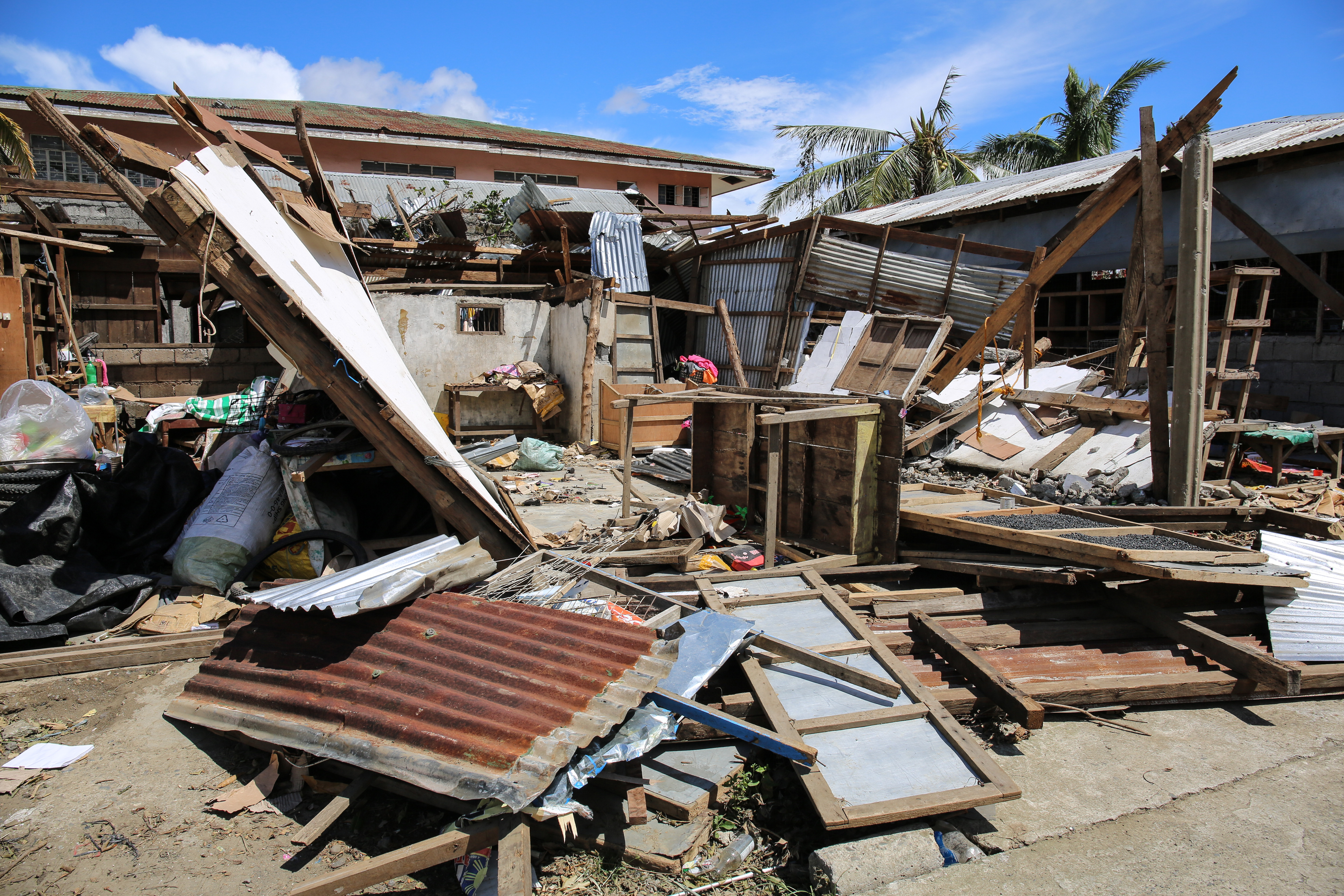 A house lies overturned outside Baggao.