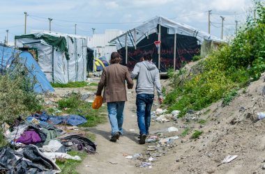 During one of James Pearce's 2016 visits to the Calais Jungle, a refugee member of PC4R recognized him from far away, greeted him warmly, and invited him to share a meal.