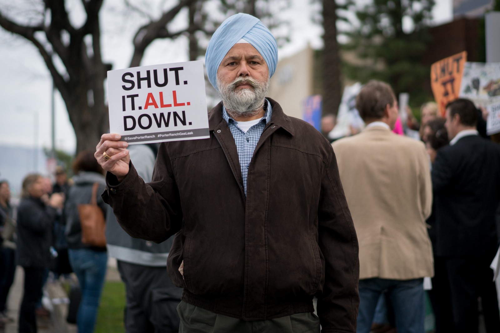 Gurbux Singh of Chatsworth protests on January 23rd outside of the Hilton Hotel in Woodland Hills before a public hearing concerning the natural gas storage facilities in Aliso Canyon. Singh says the community will “keep fighting” until the gas storage facilities surrounding nearby residential areas are permanently shut down.