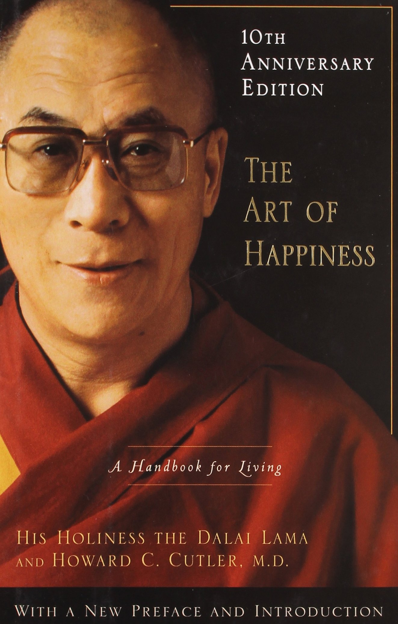 A book cover for 'The Art of Happiness: A Handbook for Living.'