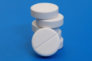 Close-up photo of a pile of round pills