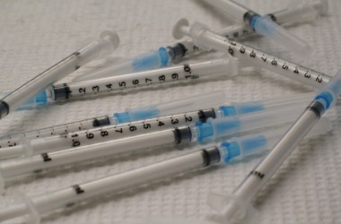 Photo showing a small pile of syringes