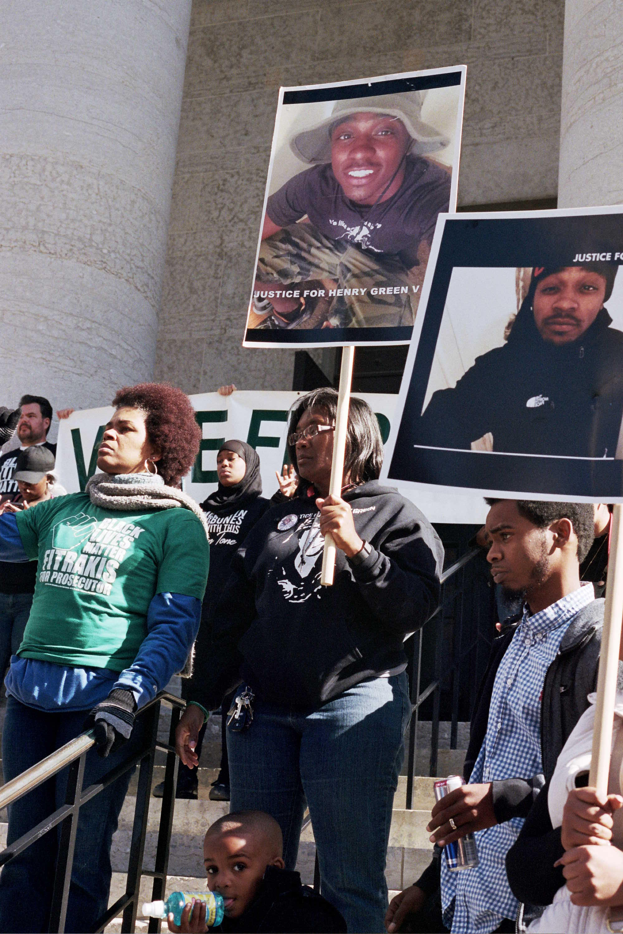 Adrienne Hood (pictured center) holds a sign of Bub outside the Franklin County Courthouse in Columbus, Ohio, in 2016.