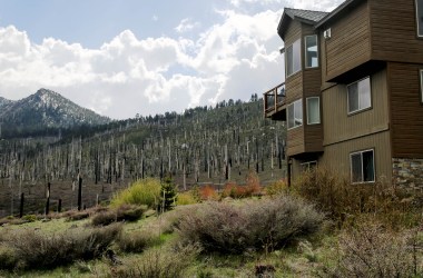 Newly constructed homes dot a charred hillside in El Dorado County, California.