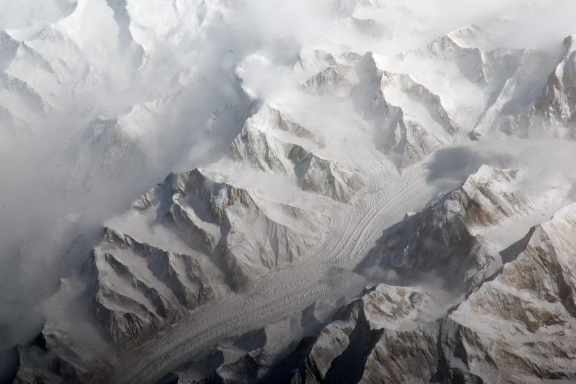 This astronaut photograph provides a view of the central Tien Shan mountains east of where the borders of China, Kyrgyzstan, and Kazakhstan meet.