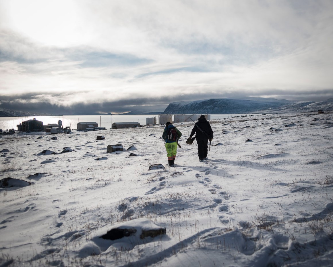 Markoosi and Nanasi Illauq walk to Clyde River's tiny harbor to set off for a day of hunting. For many Inuit, hunting represents a link to millennia of tradition—but those links are rapidly weakening in a changing climate.