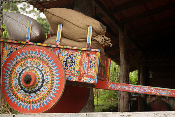 Costa Rican ox-cart loaded with coffee bags.