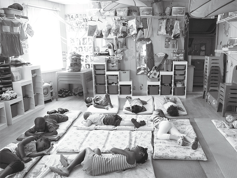 In New Rochelle, New York, boys and girls at Dee's Tots Childcare—open around the clock—nap on mattresses atop yoga mats. Some nights, half a dozen kids sleep over at Dee's.