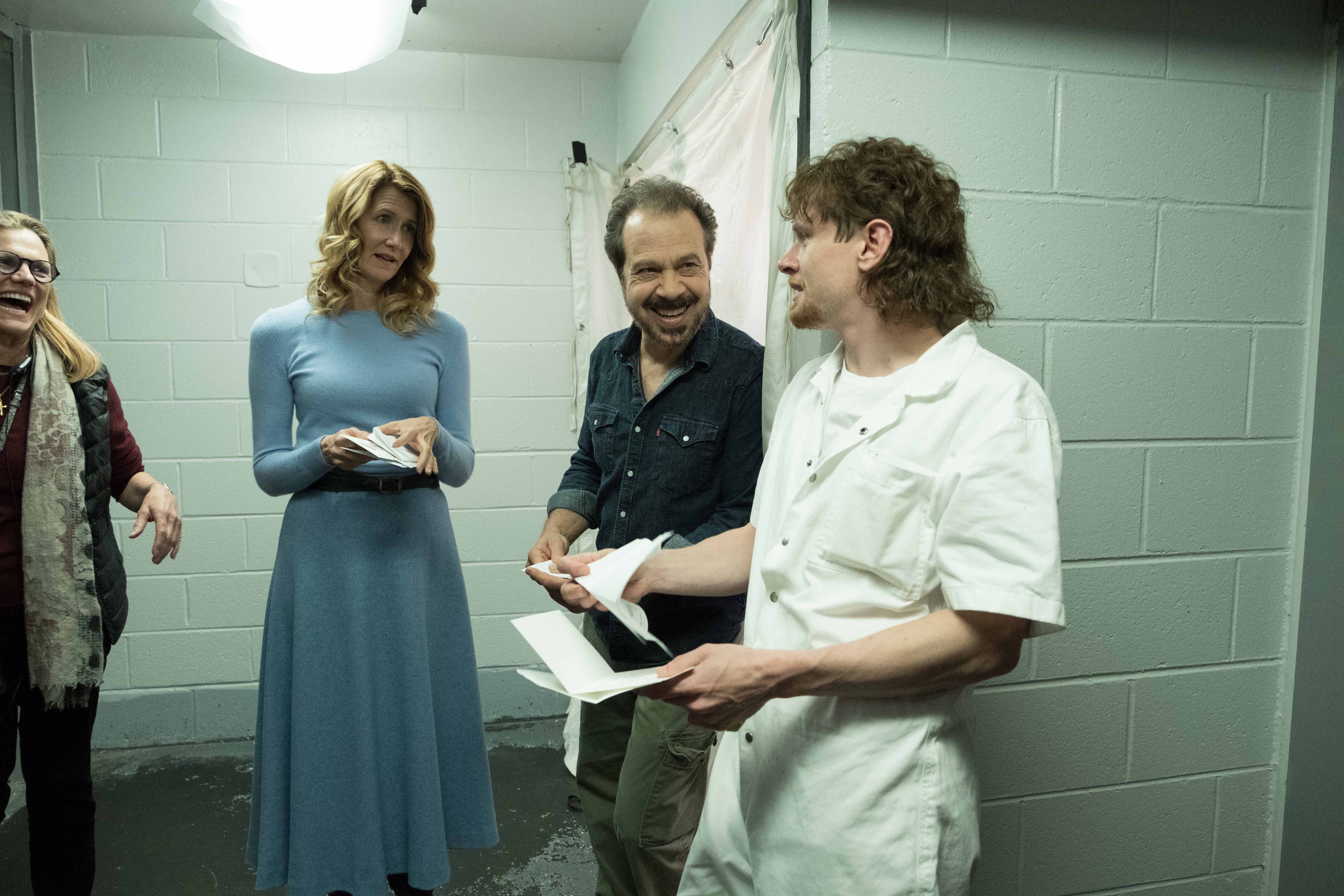 Laura Dern, Edward Zwick, and Jack O'Connell on the set of Trial by Fire.