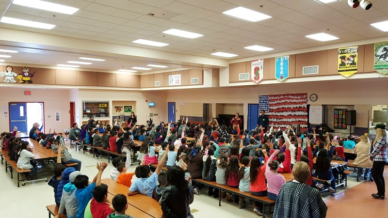 Students at El Camino Real Elementary School in Arvin, California, attend an assembly to learn about the school's new water filters that help treat arsenic and other contaminants.