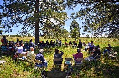 Convening Tribes gather below the Bears Ears buttes.