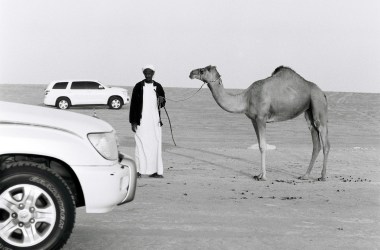 A Sudanese camel trader in the Rub' al-Khali desert in the United Arab Emirates, where the animals sell for thousands of dollars and camel beauty pageants are a regular occurrence.