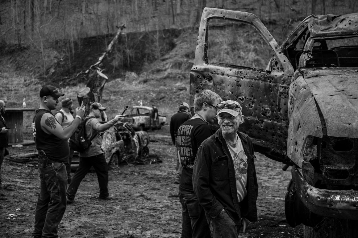 Louisville, Kentucky: Gun enthusiasts examine the wreckage at the largest machine gun event in the United States, held at the Knob Creek Gun Range, just south of the city.