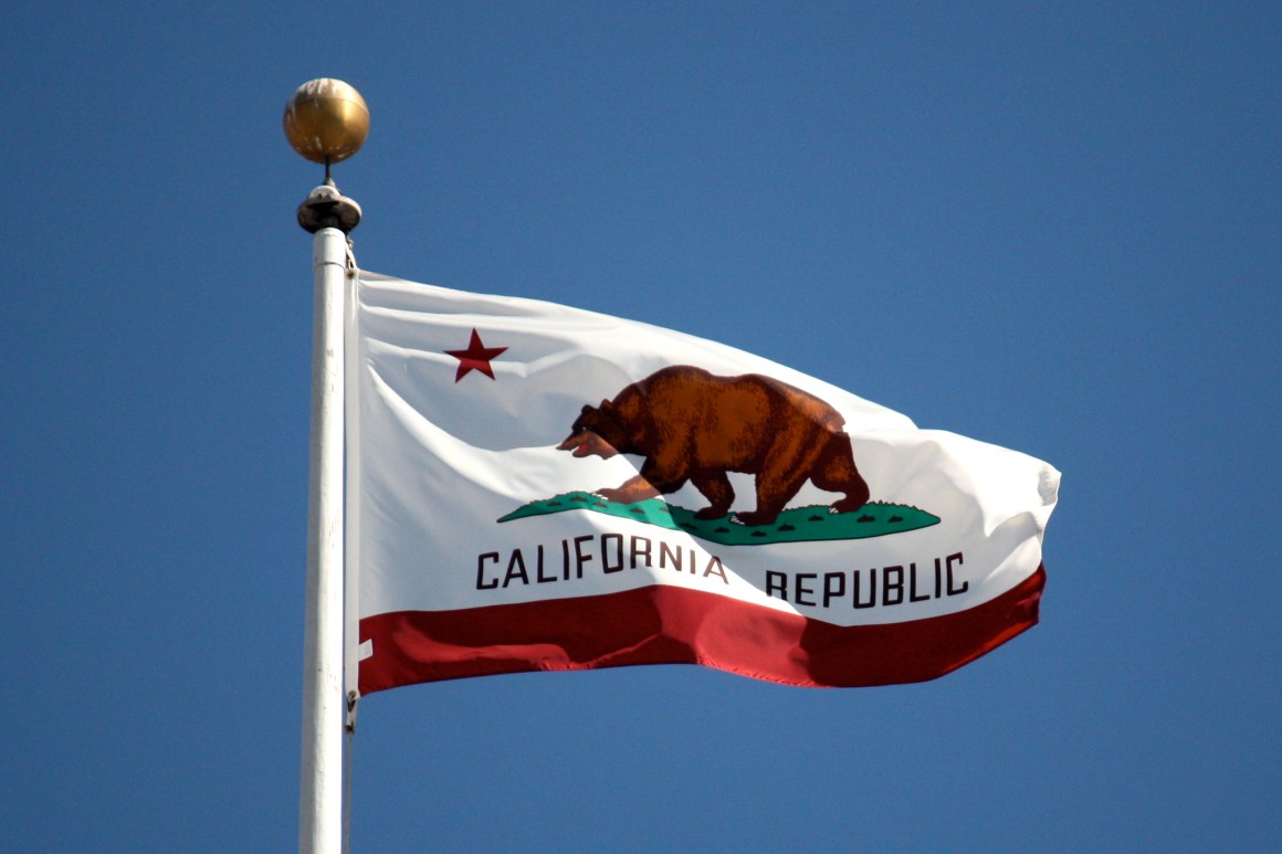 The California state flag flying at San Francisco City Hall.