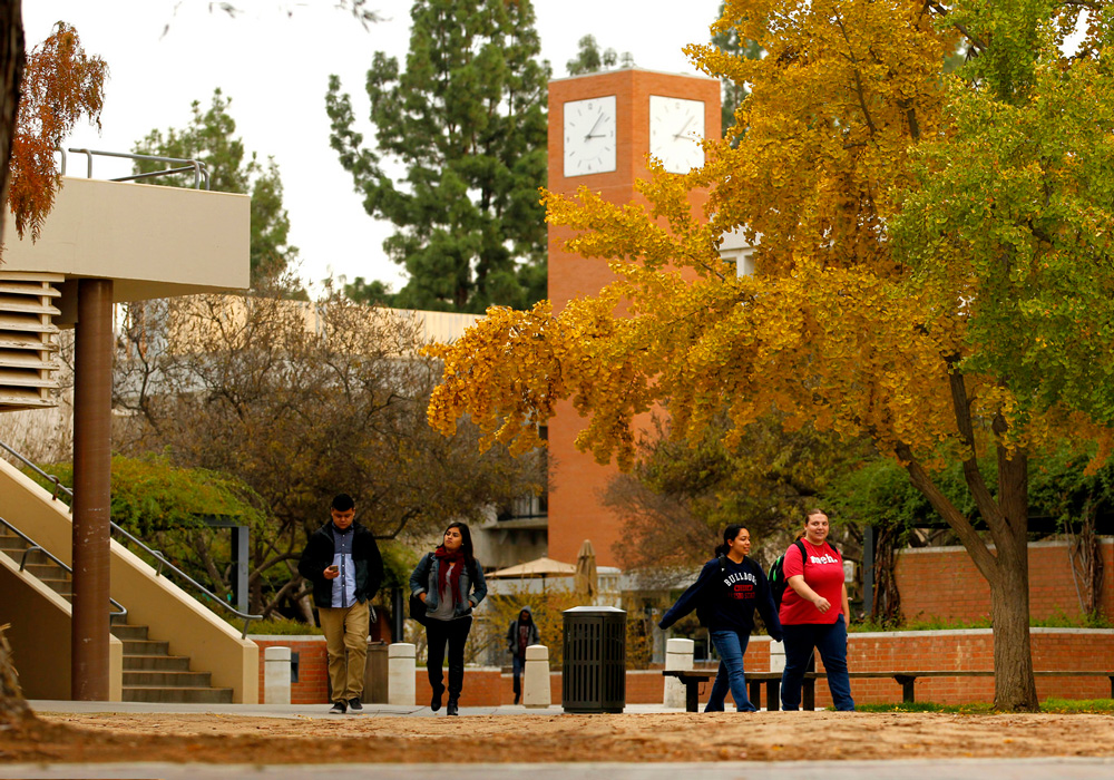 Students walk through campus at California State University–Fresno.