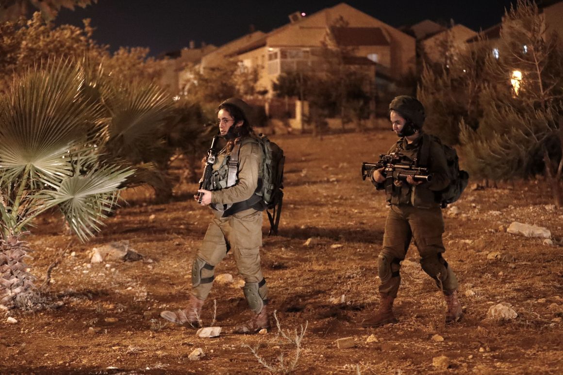 A picture taken on July 26th, 2018, shows Israeli security forces at the Adam settlement in the occupied West Bank where a stabbing attack took place.