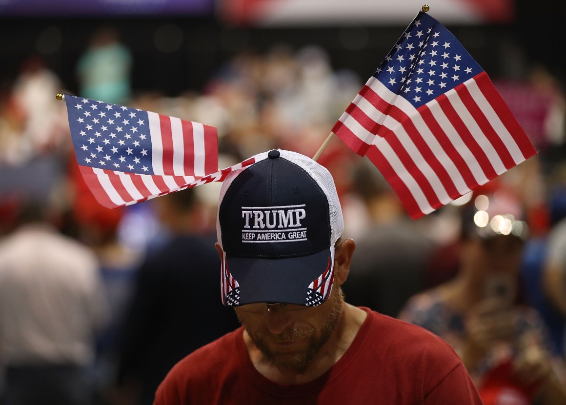 Mark Searles waits for the arrival of President Donald Trump at his Make America Great Again Rally at the Florida State Fair Grounds Expo Hall on July 31st, 2018, in Tampa, Florida.