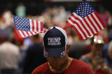 Mark Searles waits for the arrival of President Donald Trump at his Make America Great Again Rally at the Florida State Fair Grounds Expo Hall on July 31st, 2018, in Tampa, Florida.