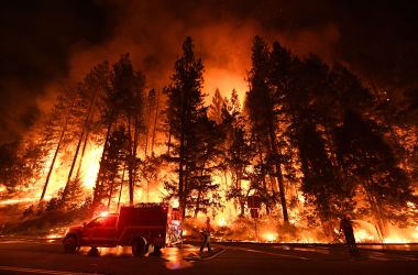 A firefighter tries to control a back burn as the Carr Fire continues to spread toward the towns of Douglas City and Lewiston near Redding, California, on July 31st, 2018.