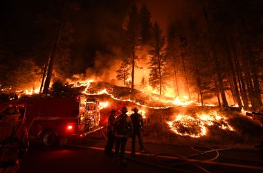 Firefighters try to control a back burn as they battle the Carr Fire near Redding, California, on July 31st, 2018.