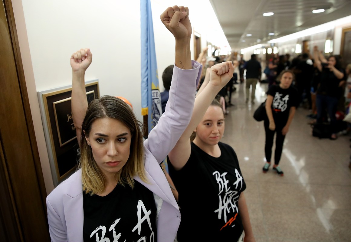 Protesters opposed to the nomination of Supreme Court nominee Judge Brett Kavanaugh gather outside the office of Senator John Thune (R-South Dakota) prior to a scheduled meeting between Thune and Kavanaugh on Capitol Hill on August 1st, 2018, in Washington, D.C.