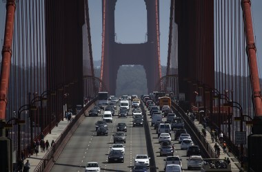 Cars drive over the Golden Gate Bridge on August 2nd, 2018, in Sausalito, California.