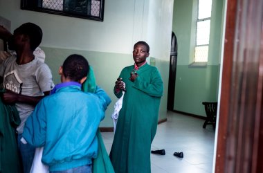 Altar boys prepare ahead of the Sunday Mass celebration at the Sacred Heart Church in Harare, Zimbabwe, on August 5th, 2018. Zimbabweans went to church for the first time since contested elections and post-poll violence shook the country, with clergymen leading prayers for peace.