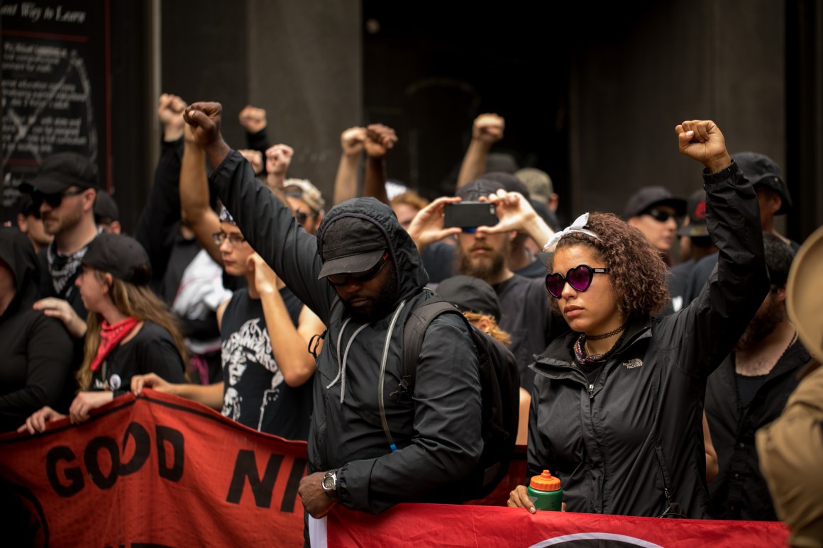 Marchers enter the mall in downtown Charlottesville, Virginia, on August 11th, 2018, one year after the violent white nationalist rally that left one person dead and dozens injured.