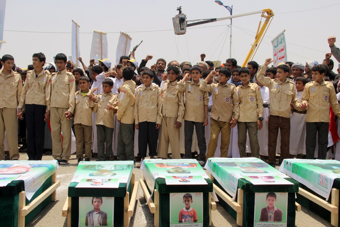 Yemeni children vent anger against Riyadh, Saudi Arabia, and Washington, D.C., on August 13th, 2018, as they take part in a mass funeral in the northern Yemeni city of Saada, a stronghold of the Iran-backed Huthi rebels, for children killed in an airstrike by the Saudi-led coalition last week. At least 29 children were among those killed in the air raid on August 9th on a bus in a crowded market in Dahyan, Saada province, according to the International Committee of the Red Cross.