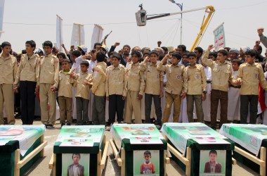 Yemeni children vent anger against Riyadh, Saudi Arabia, and Washington, D.C., on August 13th, 2018, as they take part in a mass funeral in the northern Yemeni city of Saada, a stronghold of the Iran-backed Huthi rebels, for children killed in an airstrike by the Saudi-led coalition last week. At least 29 children were among those killed in the air raid on August 9th on a bus in a crowded market in Dahyan, Saada province, according to the International Committee of the Red Cross.