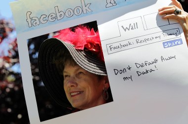 Denely Rafferty of the group Raging Grannies protests outside of Facebook headquarters in June of 2010.