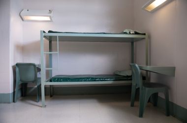 A bunk bed and desks inside a cell are seen at the Caroline Detention Facility in Bowling Green, Virginia, on August 13th, 2018. A former regional jail, the facility has been contracted by the U.S. Department of Homeland Security Immigration and Customs Enforcement to house undocumented adult immigrant detainees for violations of immigration laws.