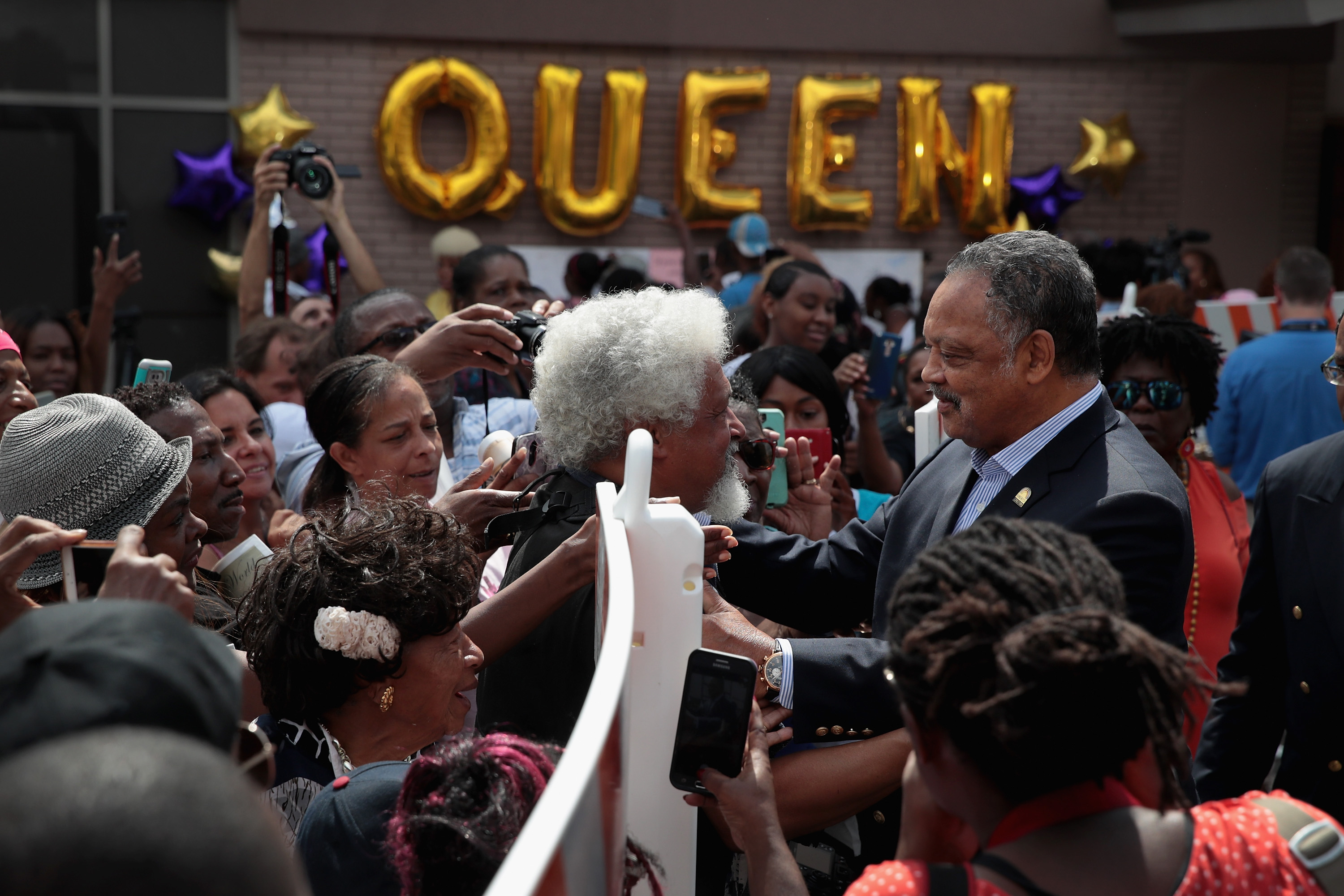 Reverend Jesse Jackson greets the crowd gathered outside the New Bethel Baptist Church for a final public viewing of the late soul singer's remains on August 30th, 2018.