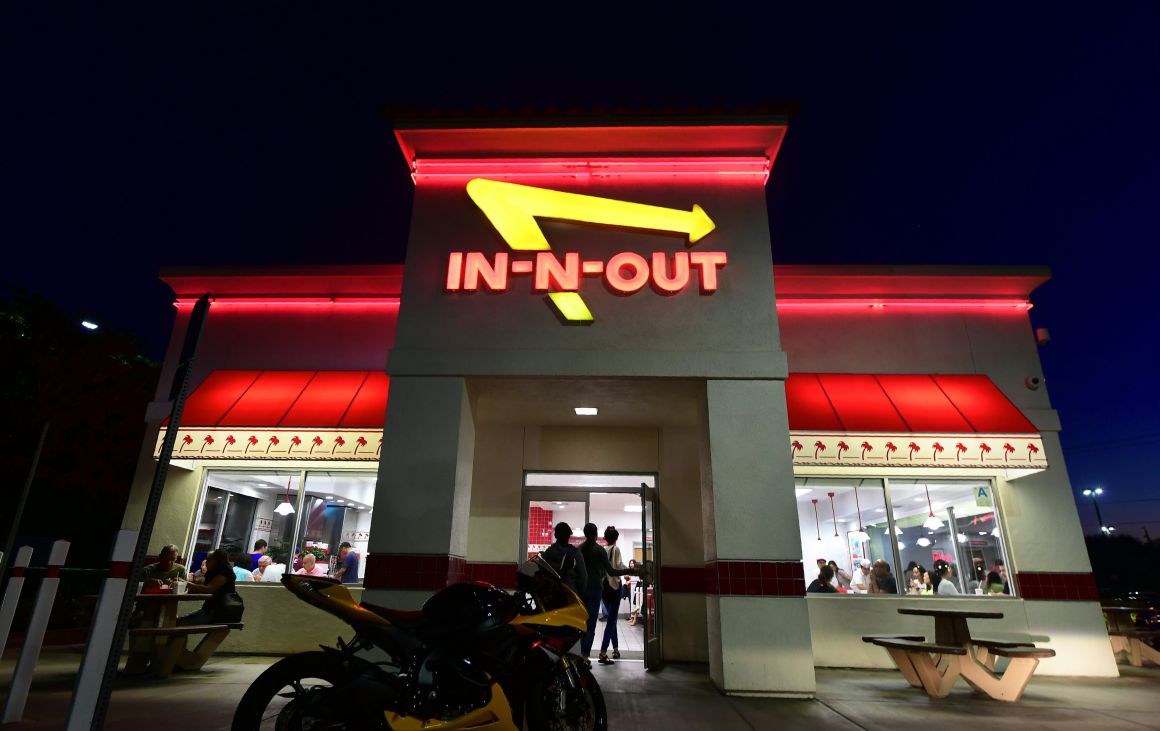 People enter an In-N-Out Burger restaurant in Alhambra, California, on August 30th, 2018.