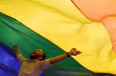 A member of the LGBT community celebrates the Supreme Court's decision to strike down a colonial-era ban on gay sex in Mumbai, India, on September 6th, 2018. In a landmark victory, the ruling overturned the ban, which had been at the center of years of legal battles for gay rights advocates.