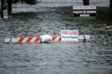 A sign warns people away from Union Point Park after it was flooded by the Neuse River during Hurricane Florence on September 13th, 2018 in New Bern, North Carolina.